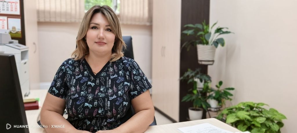 Елена Рябыкина на рабочем месте Елена Рябыкина на рабочем месте